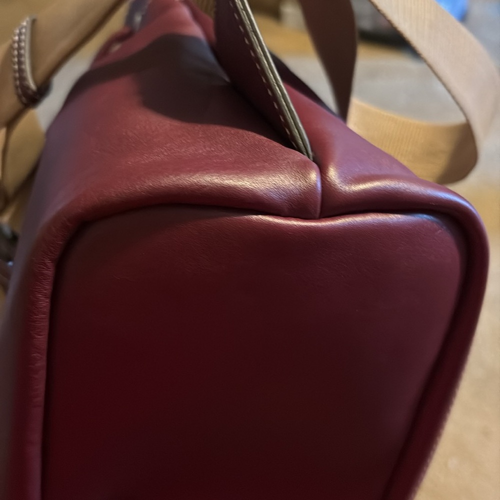 Dooney and Burke Drawstringng Backpack in color Grape. - Picture 11 of 12
